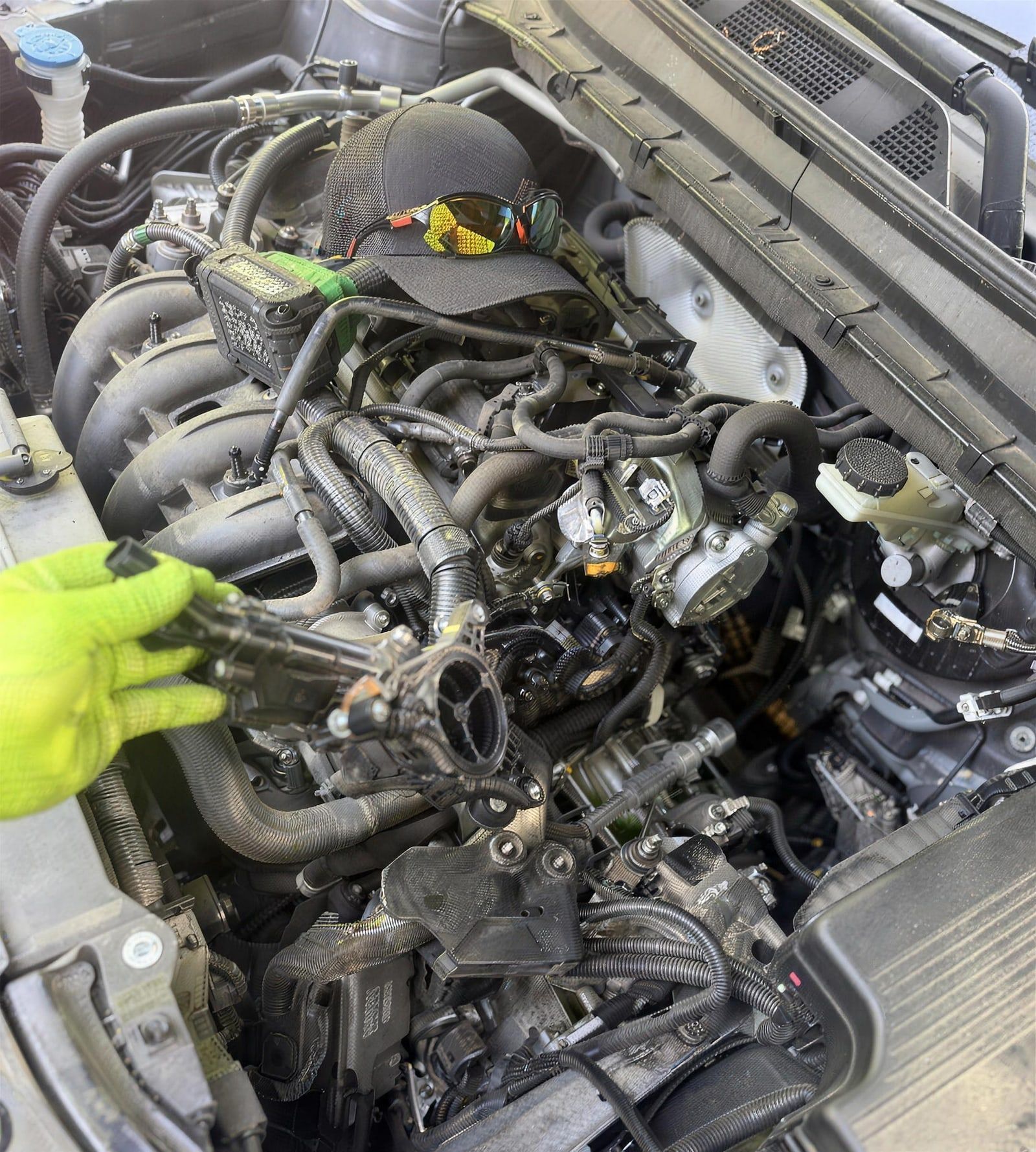 Vehicle engine teardown during timing and engine repair by H & H Auto LLC, mobile mechanic in Northwest Arkansas